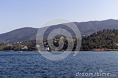 View of the embankment and yachts of the island of Paros Greece in a spring evening Stock Photo