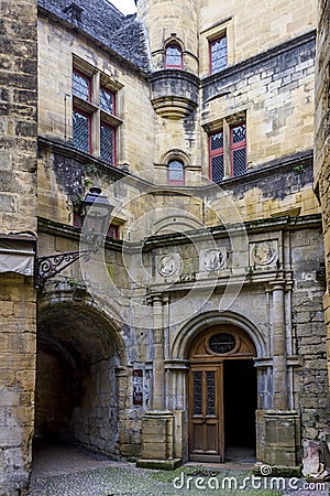 View of the entrance of Hotel de Vienne, a 16th century Renaissance building at the town Editorial Stock Photo