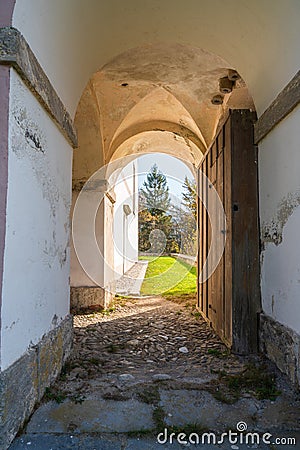 View of the entrance to the courtyard of the Church of St. Volbenka, Slovenia, Europe. Stock Photo