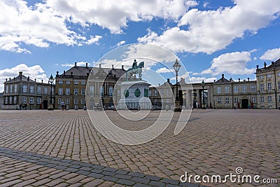 View of the equestrian statue of Frederik V and the Amalienborg Castle in Copenhagen Editorial Stock Photo