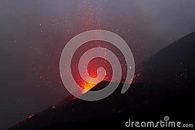 Etna during eruption with lava explosion -Sicily Stock Photo