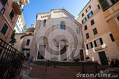 View of facade of Santa Maria di Castello church in old city centre of Genoa, Italy. Editorial Stock Photo