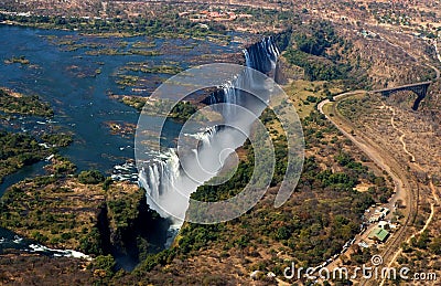 View of the Falls from a height of bird flight. Victoria Falls. Mosi-oa-Tunya National park.Zambiya. and World Heritage Site. Cartoon Illustration