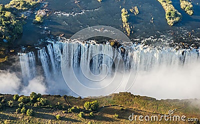 View of the Falls from a height of bird flight. Victoria Falls. Mosi-oa-Tunya National park.Zambiya. and World Heritage Site. Cartoon Illustration