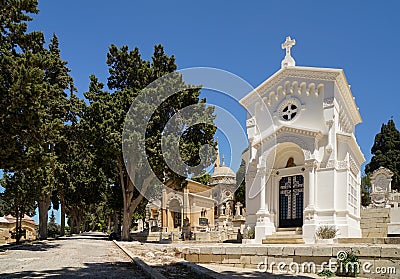 View of the family white crypt and cemetery park Stock Photo