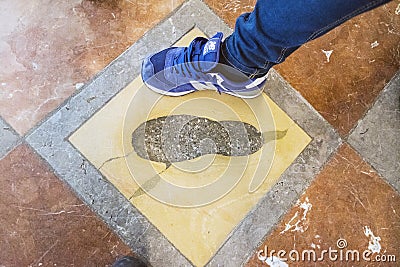 View of the famous Devil`s Footstep inside the Munich Cathedral Editorial Stock Photo