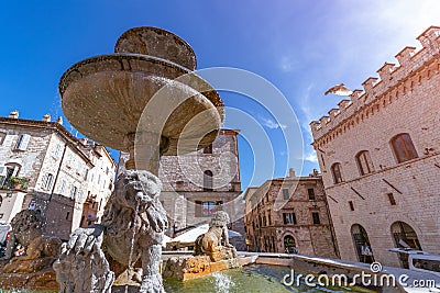 View of famous square with fountain Piazza del Comune in Assi Editorial Stock Photo