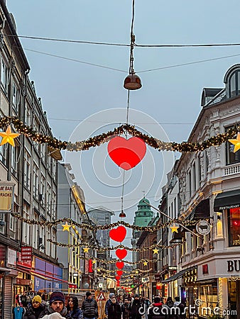 View of the famous Stroget pedestrian area in Copenhagen decorated with Christmas decorations Editorial Stock Photo