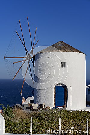 View of famous windmill in Oia Stock Photo