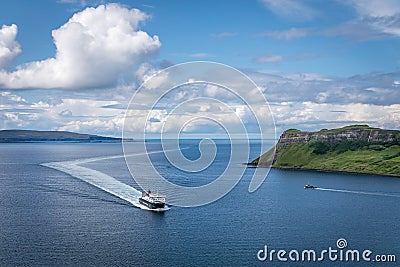 A view of a ferry coming inro uig port that has come from tarbert port Editorial Stock Photo