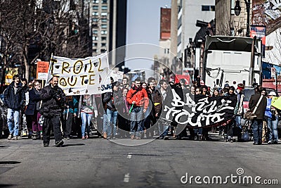 View of the First line of Protesters walking in the Street Editorial Stock Photo