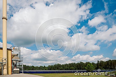 View of the first solar collector field for centralized heating in Latvia on a sunny day Stock Photo