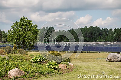 View of the first solar collector field for centralized heating in Latvia on a sunny day Stock Photo