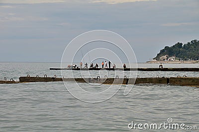 View of fishermen on beach in the Sochi, Russia Editorial Stock Photo