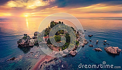 View from flying drone. Magnificent morning view of Bella island. Unbelievable spring seascape of Mediterranean sea. Fantastic sun Stock Photo