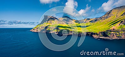 View from flying drone. Panoramic morning scene of Mulafossur Waterfall. Fantastic summer view of Vagar island, Faroe Islands, Den Stock Photo