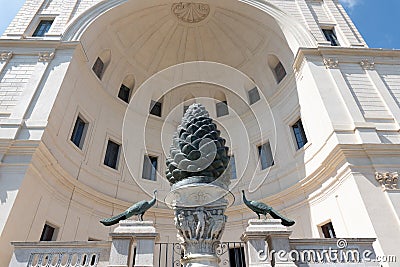 View of the Fontana della Pigna in front of niche in the wall of the Vatican building in Vatican City, in Rome, Italy Editorial Stock Photo