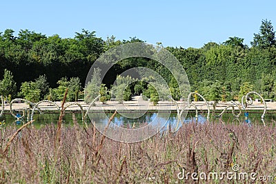 Fountain in the gardens of the Palace of Versailles Editorial Stock Photo
