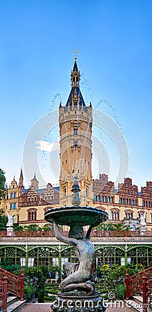 View of the fountain with the Schwerin castle in the background. Vertical panorama. Mecklenburg-Vorpommern, Germany Stock Photo