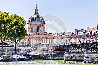 View of the French Institute Academie Francaise and Arts bridge Editorial Stock Photo