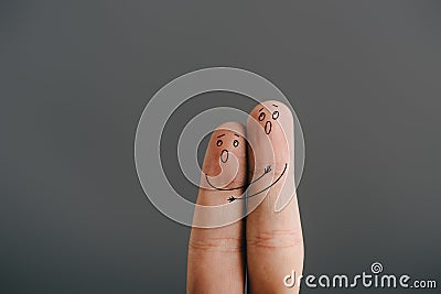 View of frightened couple of fingers hugging and screaming isolated on grey Stock Photo