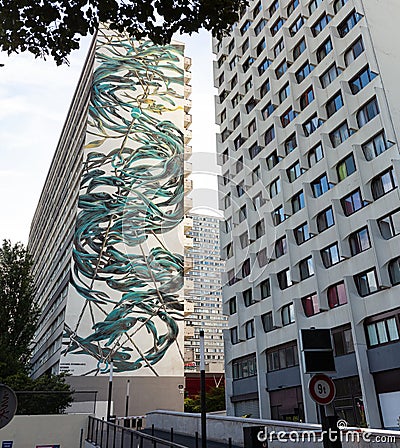 View of the giant murales painted by the artist Pantonio on the Siena tower in Paris Editorial Stock Photo