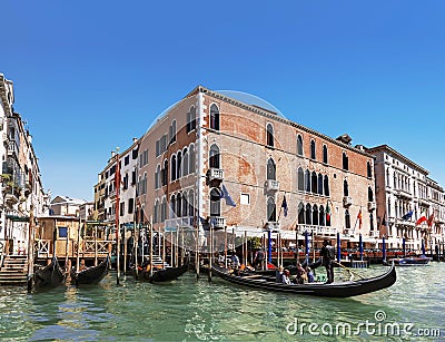 View on the Grand canal and gondolas with tourists, Venice Editorial Stock Photo