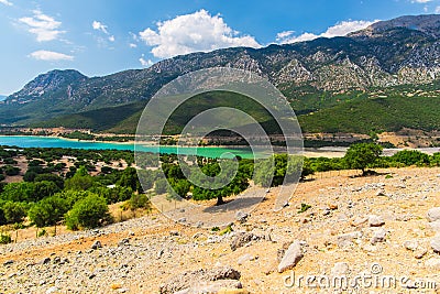 View in Greek Mountains with green lake, greece Stock Photo