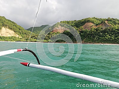 View of green mountains and hills of Mindoro from boat Stock Photo