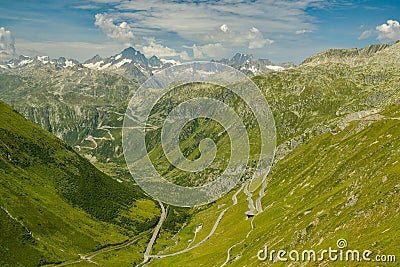 View on Grimsel and Furka high mountain passes and surrounding mountains in Swiss Alps Stock Photo