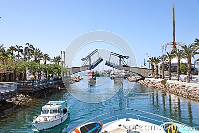 View of the Gulf of Eilat with luxury yachts. The moment of opening the bridge to exit the yacht from the bay Editorial Stock Photo