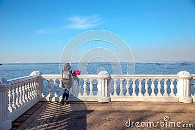 View of the Gulf of Finland and the white Baroque fence in the Peterhof Museum. St. Petersburg, Russia. Editorial Stock Photo