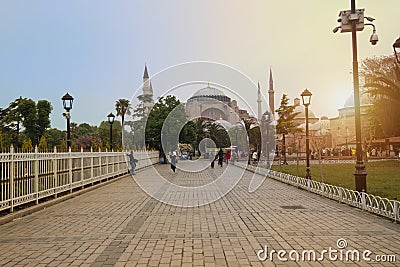 A view of the Hagia Sophia at dawn, at the end of a long, paved pedestrian area Editorial Stock Photo