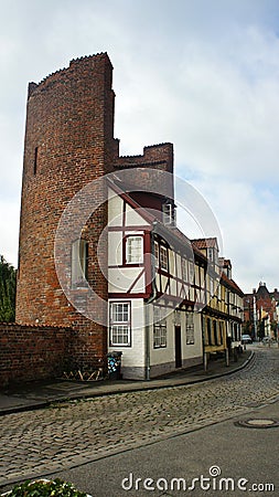 View of the Halbturm-Haus, a half-timbered house at the street An der Mauer, beautiful architecture, Lubeck, Germany Editorial Stock Photo