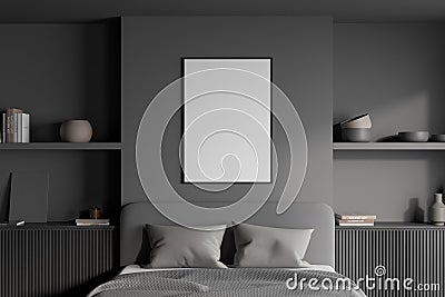 View of a headboard area in a grey bedroom with a poster Stock Photo