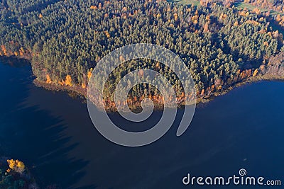 View from height on the autumn coast of the lake Dolysets top view. Pskov region, Russia Stock Photo