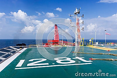 A view from a helipad or helideck for helicopter landing on board a construction work barge Stock Photo
