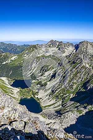 A view of the High Tatras with the Temnosmrecenske lakes from the Koprovsky Stit, Slovakia Stock Photo