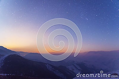 View on the hil and mountains in the starry night. Stock Photo