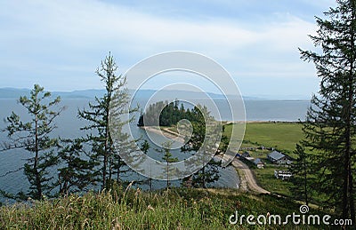 View from the hill on the Katun village near the Chivyrkuisky Bay of Lake Baikal, Svyatoy Nos `Holy Nose` Peninsula Stock Photo