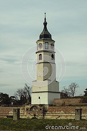 View of the historic clock tower in Kalemegdan Park against a cloudy sky Editorial Stock Photo