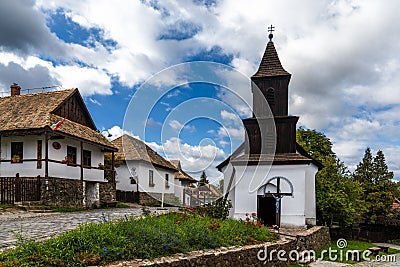 View of the historic village center and old church in Holloko Stock Photo