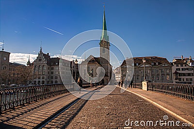 View of historic Zurich city center with famous Fraumunster Church photo taken from the Munsterbrucke bridge which is a Editorial Stock Photo