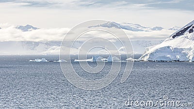 View of ice mountains on bay in Antarctica Stock Photo