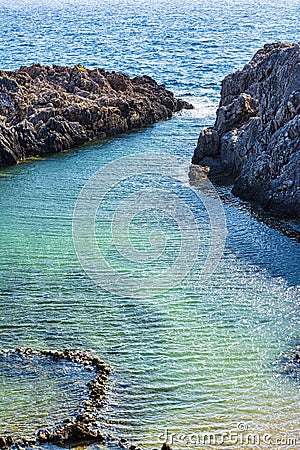 View of the iconic secluded beach of Glossa near the famous Voidokilia beach Stock Photo