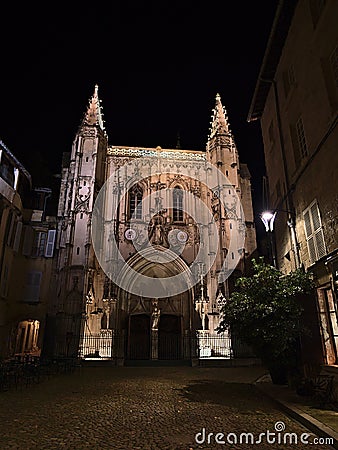 View of illuminated gothic church Basilique Saint-Pierre in the historic center of Avignon, Provence, France in the evening. Stock Photo