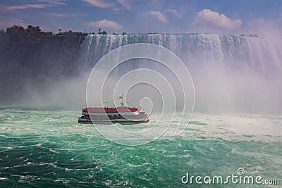 The The Maid of mist at the impressive Niagara Falls, Ontario, Canada Stock Photo