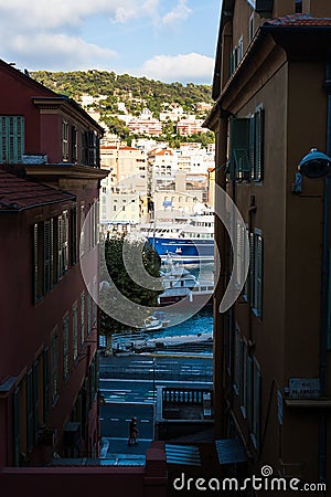 A view inbetween apartment buildings of port Lympia in Nice. Editorial Stock Photo