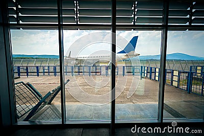 View from inside of airport on the plane on runway Stock Photo