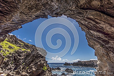 View from inside the cave of Ana Kai Tangata, the cave of the cannibals Stock Photo